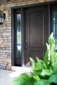 A stylish ProVia front entry door with sidleites